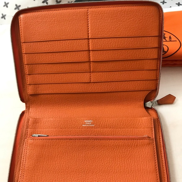 Hermes Handbags - AUTH Hermes large zipper wallet organizer orange